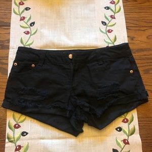 Black distressed shorts
